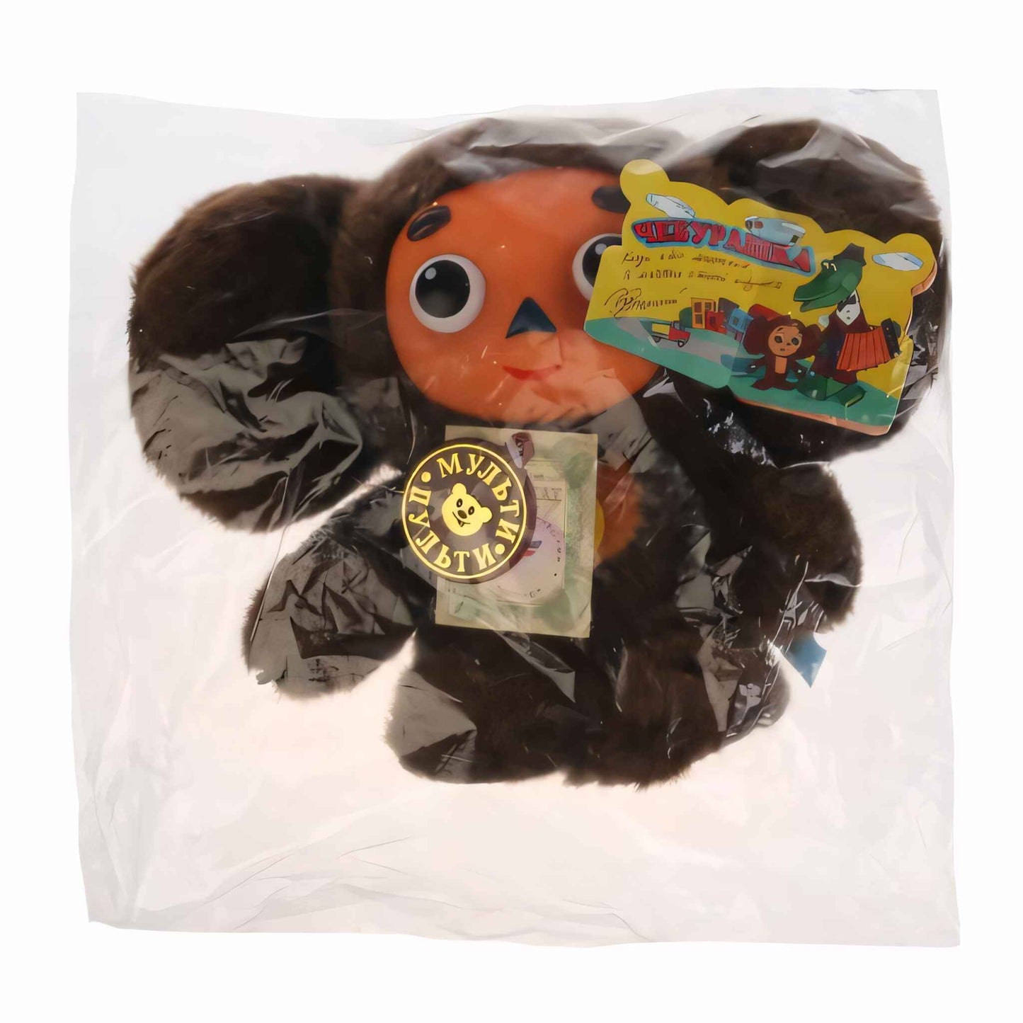 МЯГКАЯ ИГРУШКА "МУЛЬТИ-ПУЛЬТИ" ЧЕБУРАШКА С ПЛАСТ. МОРДОЧКОЙ, ОЗВУЧ. РУСС. ЧИП В ПАК. 17СМ в кор.24шт