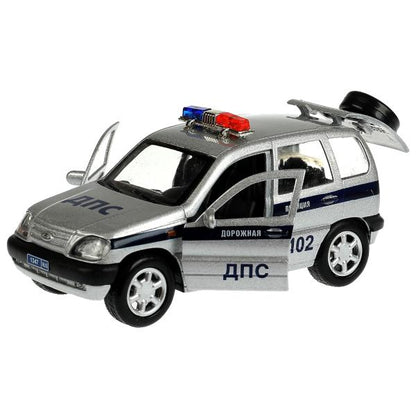 Машина металл LADA NIVA ПОЛИЦИЯ 12 см, двери, багаж, инерц, серебрист, кор. Технопарк в кор.2*36шт