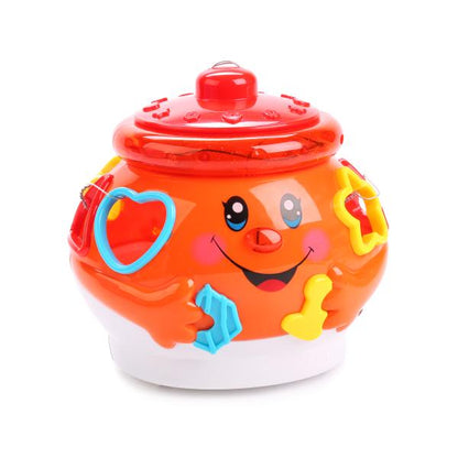 ИГРУШКА РАЗВИВАЮЩ. "ПОЮЩИЙ ГОРШОЧЕК" СВЕТ+ЗВУК, С ЛОГИЧ. КУБИКАМИ 915 В КОР. 23*23*15СМ в кор.2*12шт