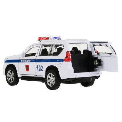 Machine en métal "toyota prado policia" 12 cm, ouverte. двери, инерц., белый в кор. Parc technologique en cor2*36шт