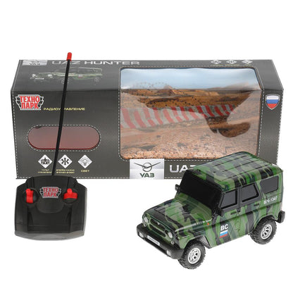 Машина р/у UAZ HUNTER 18 см, свет, камуф, кор. Технопарк в кор.2*24шт