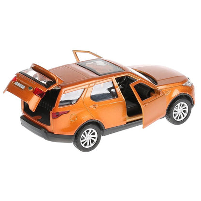 Machine en métal LAND ROVER DISCOVERY 12 cm, ouverte. двери, инерц, золотой,в кор. Parc technologique dans le cor.2*36шт