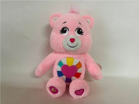 Игрушка мягкая мишка care bears роз. с сердцем 20 см, озвуч. Добрые игрушки в кор.24шт