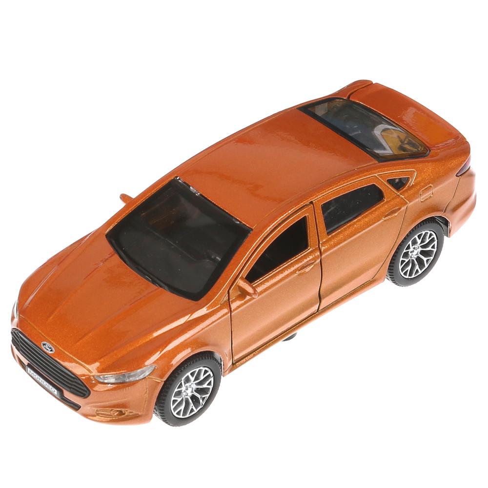 Le véhicule en métal FORD MONDEO, d'une durée de 12 cm, s'ouvre à l'extérieur, est équipé d'un moteur, d'une pièce de monnaie. Parc technologique dans le cor.2*36шт