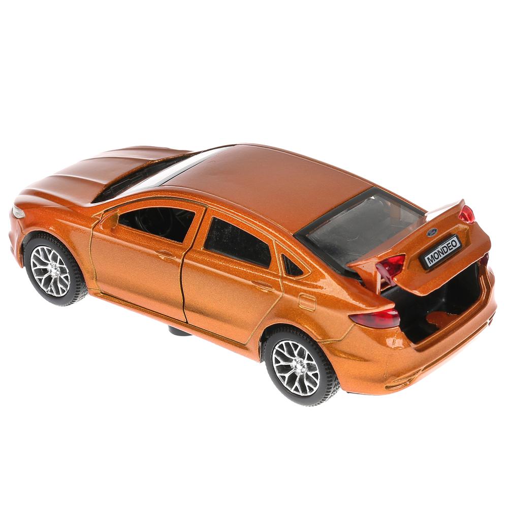 Le véhicule en métal FORD MONDEO, d'une durée de 12 cm, s'ouvre à l'extérieur, est équipé d'un moteur, d'une pièce de monnaie. Parc technologique dans le cor.2*36шт